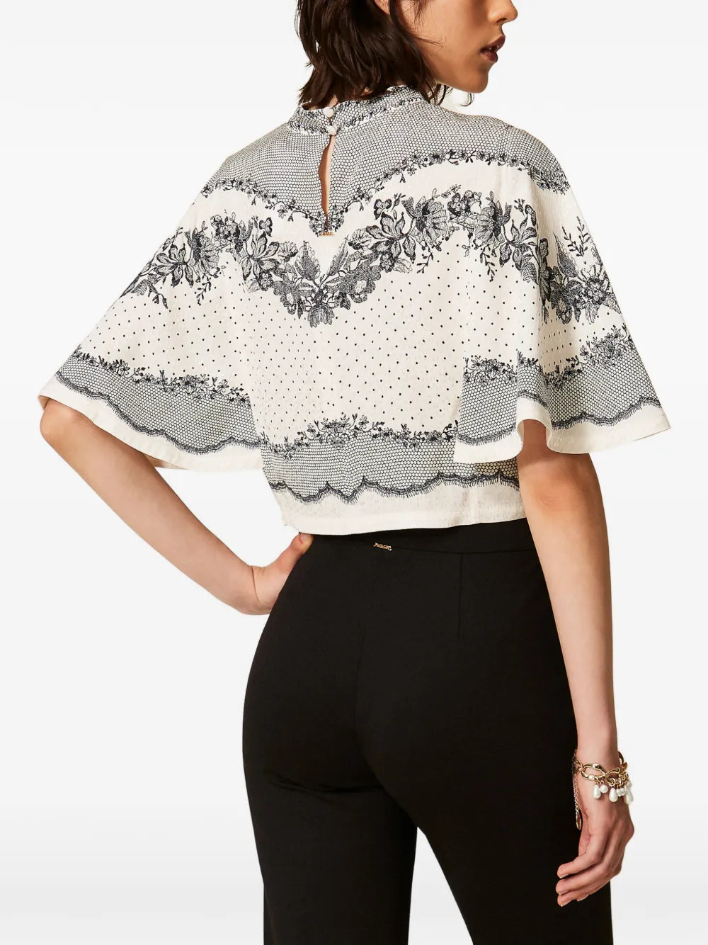 BLUSA EFECTO CAPA