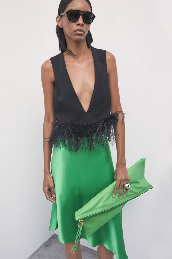 TOP PLUMAS