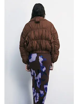 PLUMAS BROWN