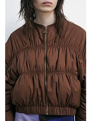 PLUMAS BROWN