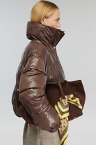 PLUMAS BROWN