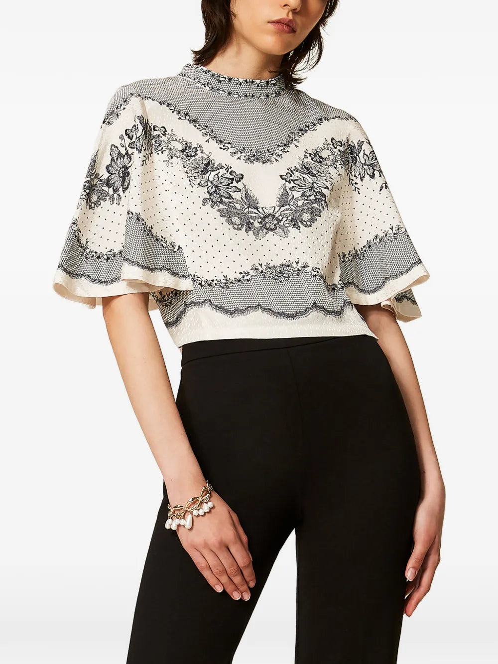 BLUSA EFECTO CAPA