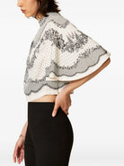 BLUSA EFECTO CAPA
