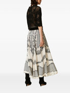 FALDA MIDI FLORES LUNARES