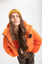 PLUMAS CORTO NARANJA